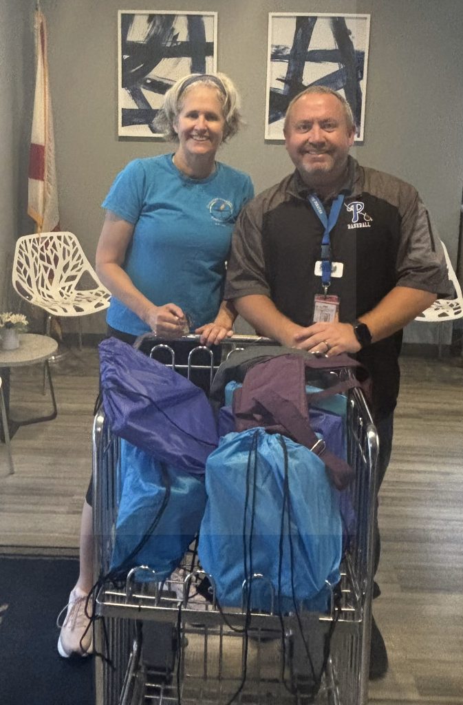 Here is co-chair Jane with Pryor Principal Jason McClelland